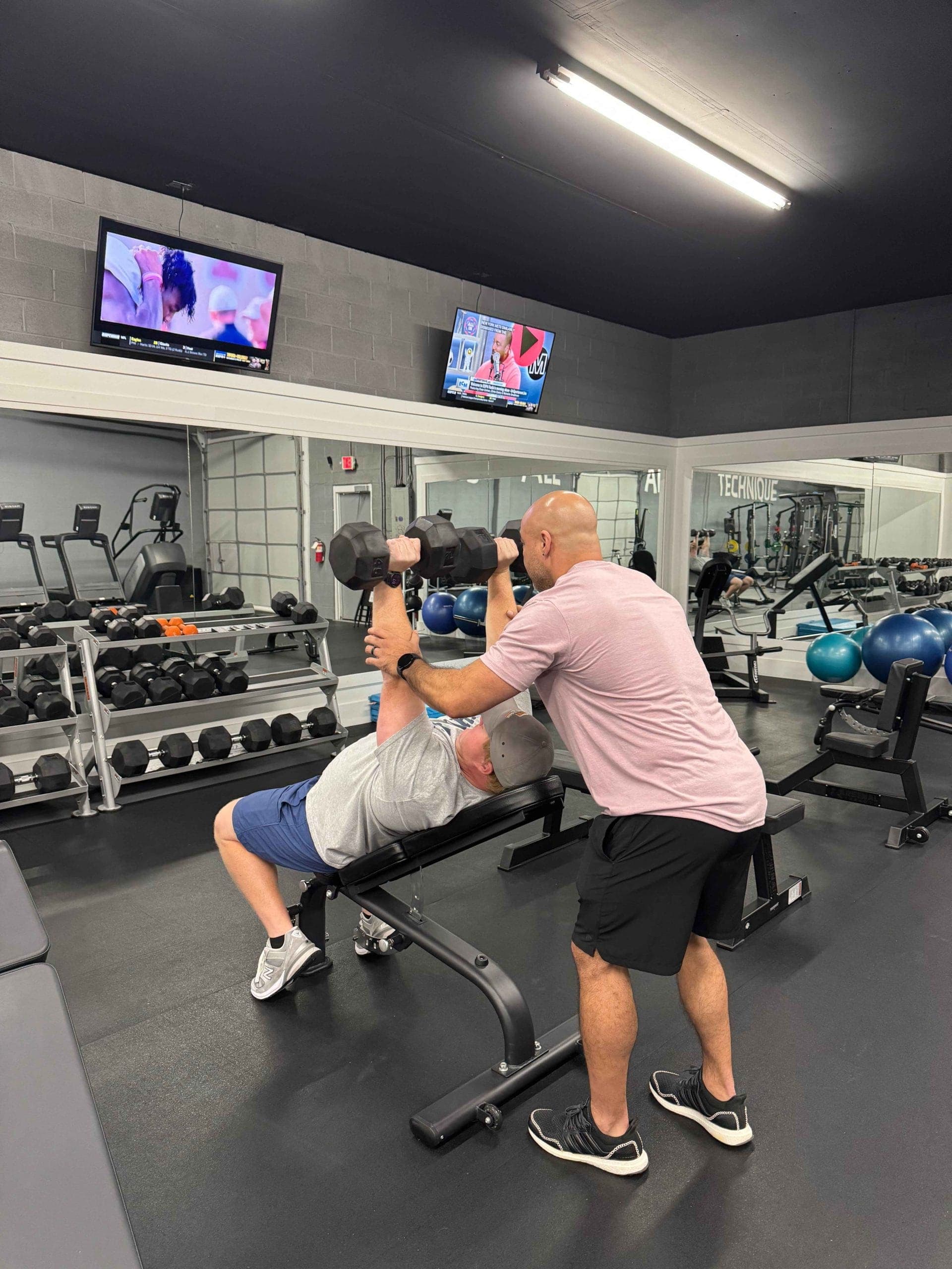 Wide view of the Technique Fitness gym floor